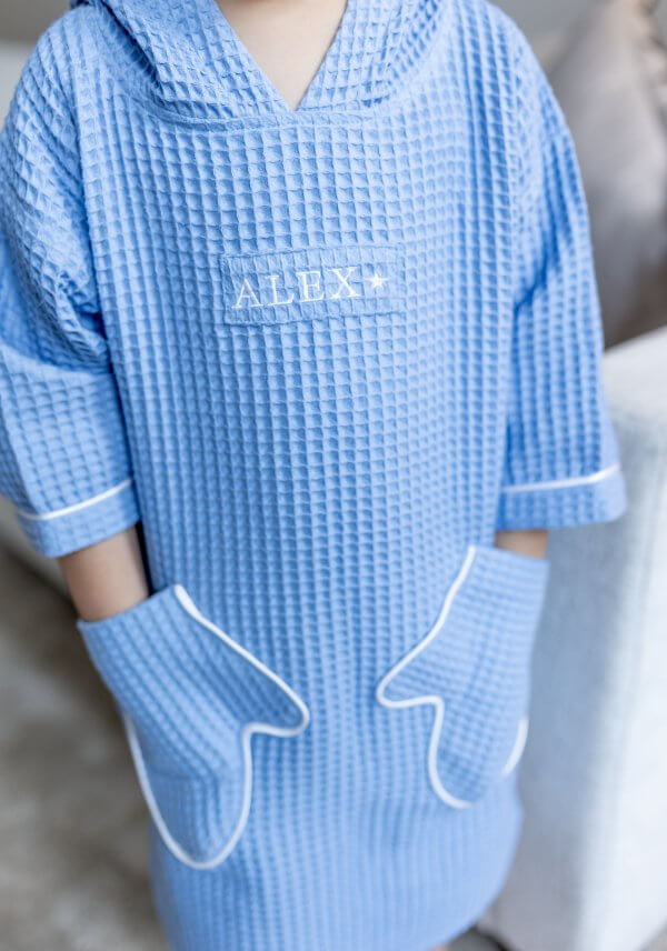 Vaikiškas žydras vaflinio audinio pončas