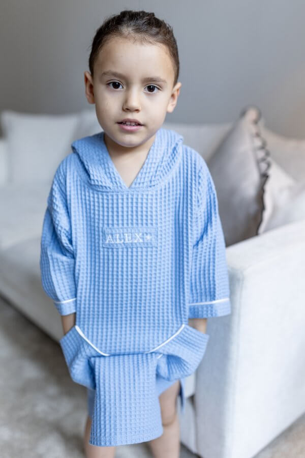 Vaikiškas žydras vaflinio audinio pončas