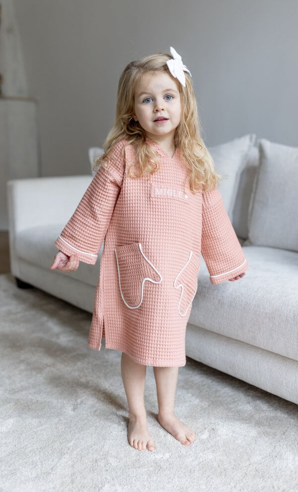 Vaikiškas rausvas vaflinio audinio pončas