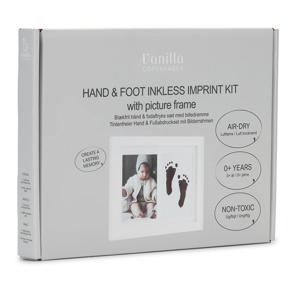 Baltas rėmelis su kūdikio rankos/pėdos atspaudu