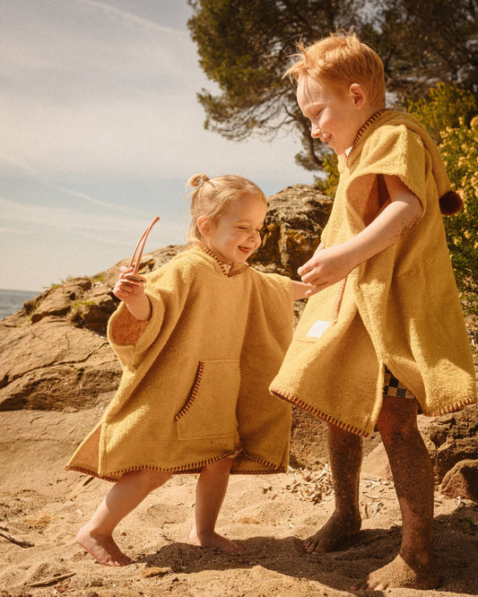 Vaikiškas pončas iš minkšto kilpinio audinio