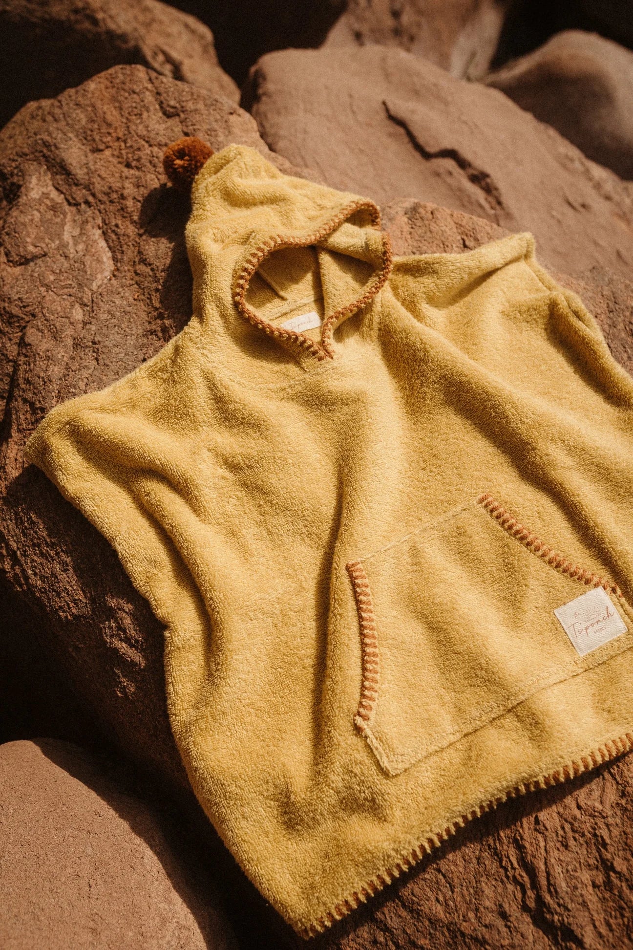 Vaikiškas pončas iš minkšto kilpinio audinio