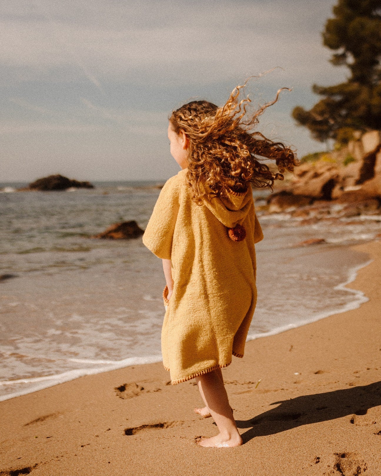 Vaikiškas pončas iš minkšto kilpinio audinio